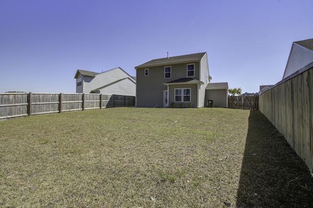 491 Fox Sparrow Ct, Summerville, SC 29486 - back of house with a fenced backyard and a yard