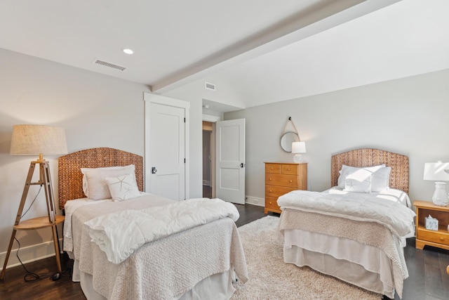 bedroom with visible vents, baseboards, and dark wood-style floors