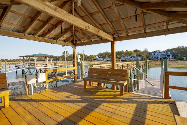 dock area featuring a gazebo and a water view