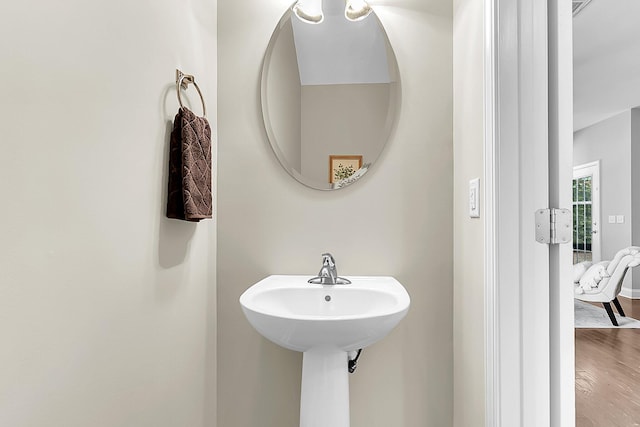 bathroom featuring wood-type flooring