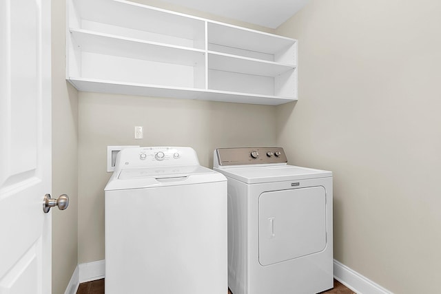 laundry room featuring independent washer and dryer