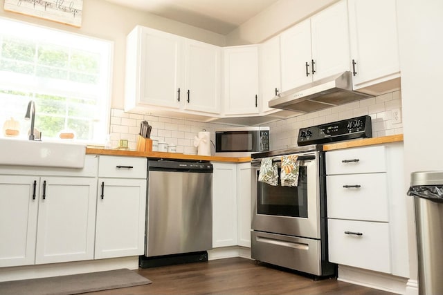 407 Tammie Ave, Goose Creek, SC 29445 - kitchen featuring stainless steel appliances, a sink, butcher block countertops, white cabinetry, and under cabinet range hood