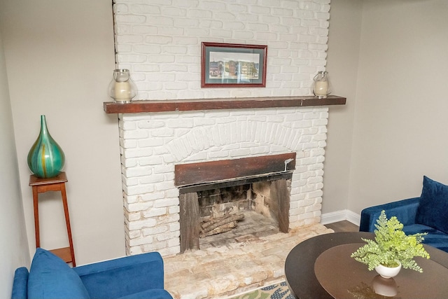 407 Tammie Ave, Goose Creek, SC 29445 - details featuring baseboards, a brick fireplace, and wood finished floors