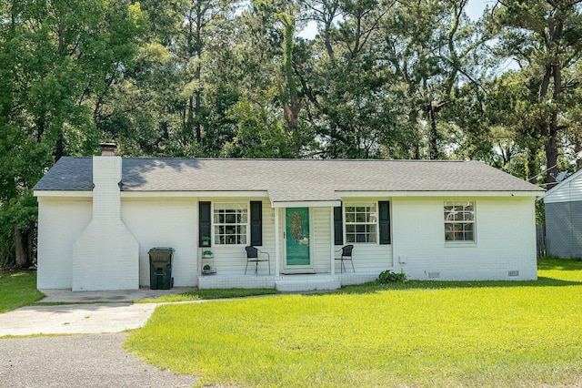 407 Tammie Ave, Goose Creek, SC 29445 - ranch-style home featuring a chimney, a porch, a front yard, brick siding, and roof with shingles