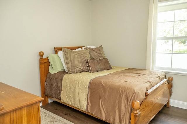407 Tammie Ave, Goose Creek, SC 29445 - bedroom with baseboards, wood finished floors, and multiple windows