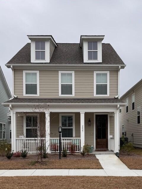 view of front of property featuring covered porch