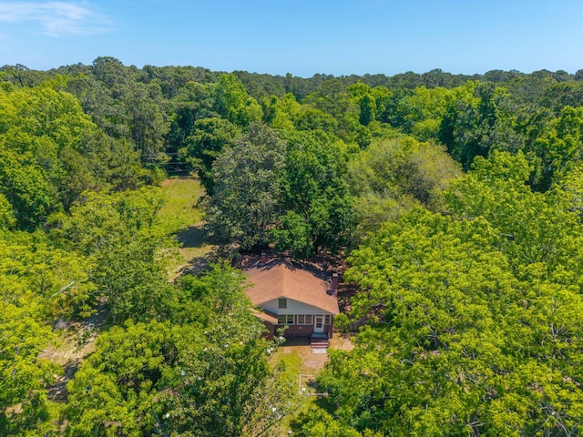 bird's eye view featuring a forest view