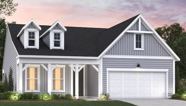 451 White Magnolia St, Moncks Corner, SC 29461 - view of front of house with board and batten siding, concrete driveway, and a garage