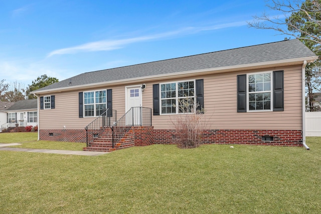 view of front of home with a front lawn