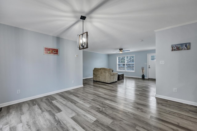 unfurnished room with crown molding, ceiling fan, and hardwood / wood-style floors