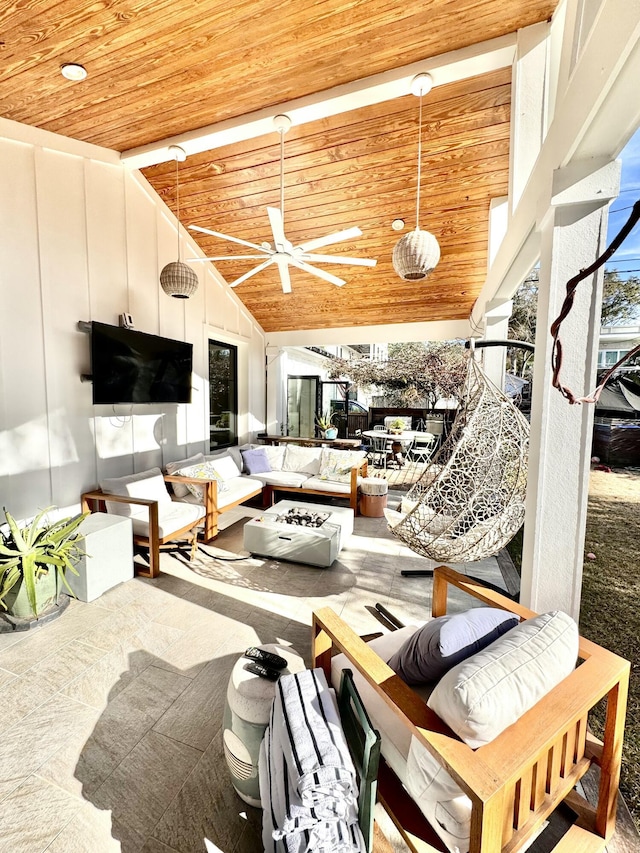 living room featuring high vaulted ceiling and wooden ceiling