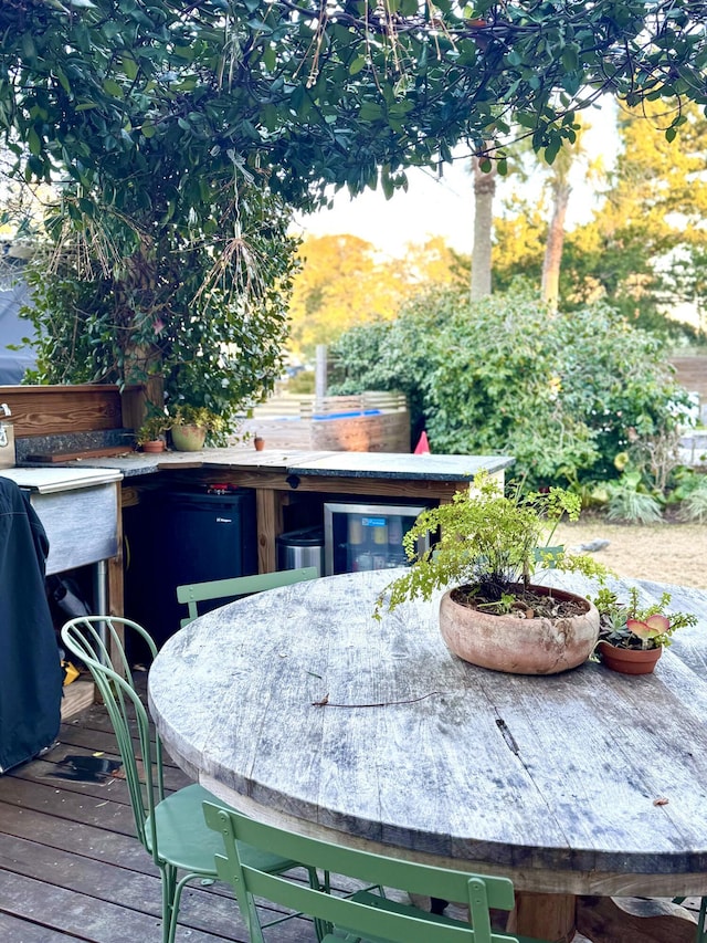 deck featuring an outdoor bar