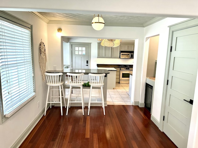 unfurnished dining area featuring a healthy amount of sunlight and crown molding