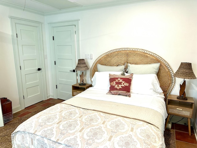 bedroom with ornamental molding