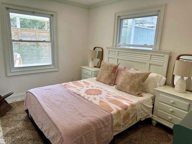 bedroom featuring crown molding