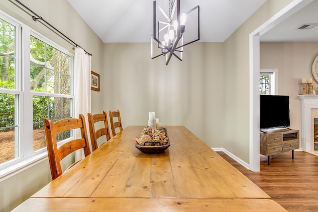 261 Mossy Oak Way, Mount Pleasant, SC 29464 - dining area featuring wood finished floors, a chandelier, and baseboards