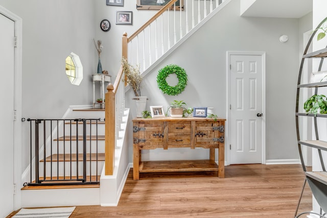 261 Mossy Oak Way, Mount Pleasant, SC 29464 - stairs featuring wood finished floors and a high ceiling