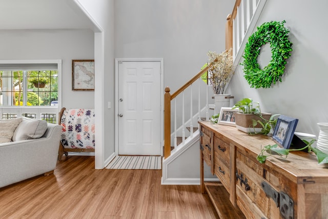 261 Mossy Oak Way, Mount Pleasant, SC 29464 - entrance foyer featuring light wood-style floors, baseboards, and stairway