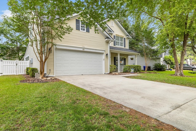 261 Mossy Oak Way, Mount Pleasant, SC 29464 - traditional home with an attached garage, driveway, covered porch, and a gate