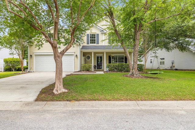 261 Mossy Oak Way, Mount Pleasant, SC 29464 - traditional home featuring concrete driveway, a front lawn, a porch, and a garage