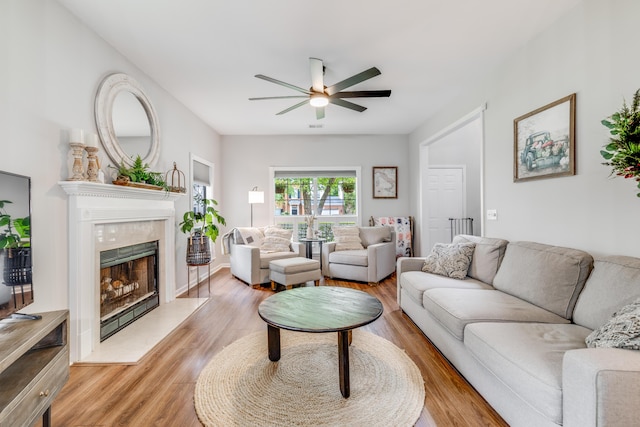 261 Mossy Oak Way, Mount Pleasant, SC 29464 - living room with ceiling fan, a premium fireplace, and light wood finished floors