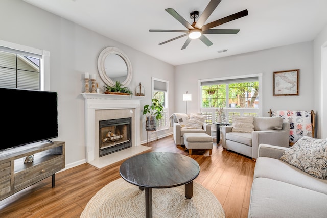 261 Mossy Oak Way, Mount Pleasant, SC 29464 - living area with a ceiling fan, wood finished floors, and a fireplace