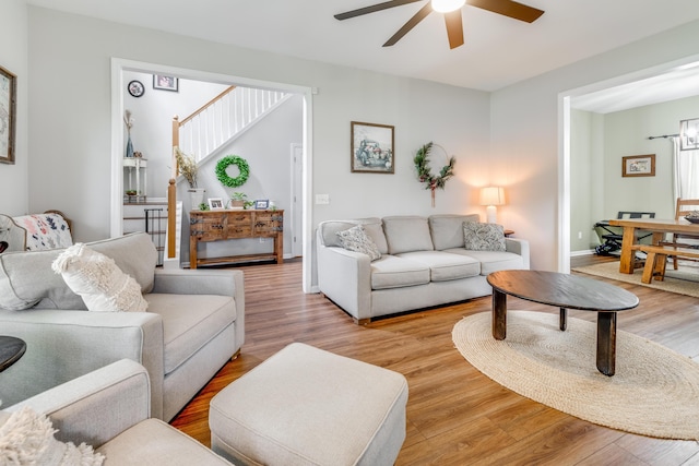 261 Mossy Oak Way, Mount Pleasant, SC 29464 - living area with a ceiling fan, light wood-style floors, and baseboards