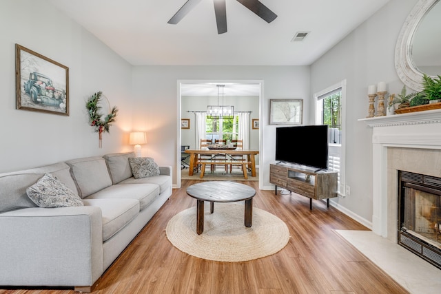 261 Mossy Oak Way, Mount Pleasant, SC 29464 - living area featuring a ceiling fan, plenty of natural light, light wood-style flooring, and a fireplace