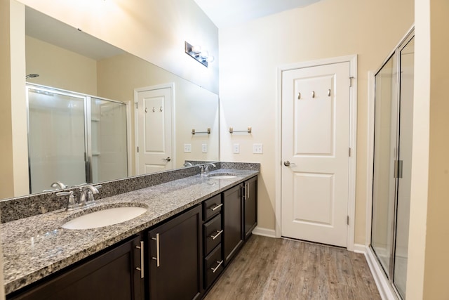 5001 Hay Bale Ct, Summerville, SC 29485 - full bath with a stall shower, wood finished floors, double vanity, and baseboards