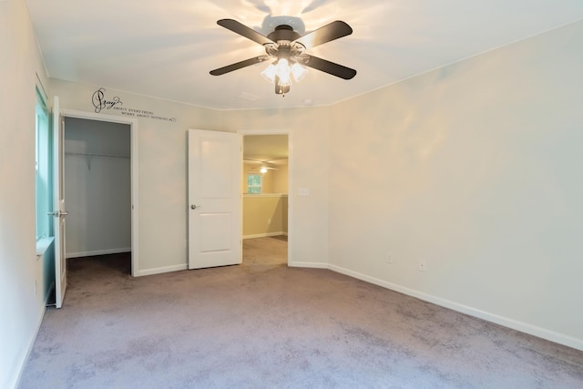5001 Hay Bale Ct, Summerville, SC 29485 - unfurnished bedroom with carpet flooring, a closet, baseboards, and a ceiling fan