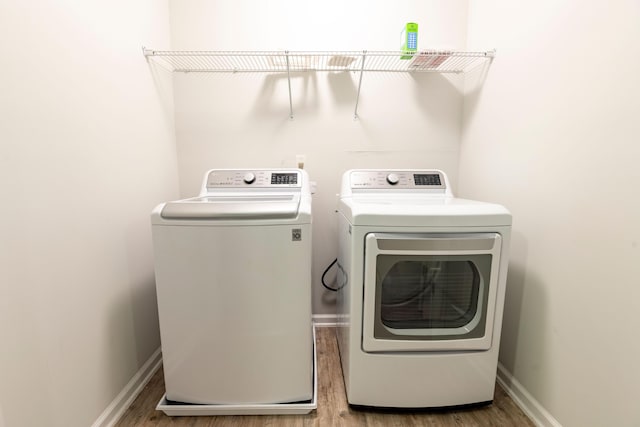 5001 Hay Bale Ct, Summerville, SC 29485 - washroom featuring independent washer and dryer, wood finished floors, and baseboards