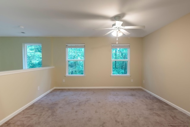 5001 Hay Bale Ct, Summerville, SC 29485 - empty room featuring a ceiling fan, healthy amount of natural light, carpet floors, and baseboards
