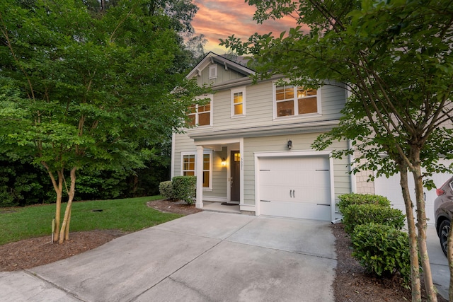 5001 Hay Bale Ct, Summerville, SC 29485 - view of front facade with driveway, a garage, and a lawn