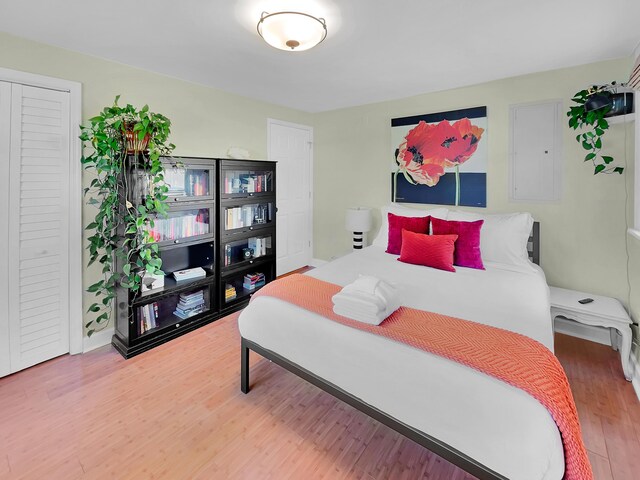 bedroom with wood finished floors