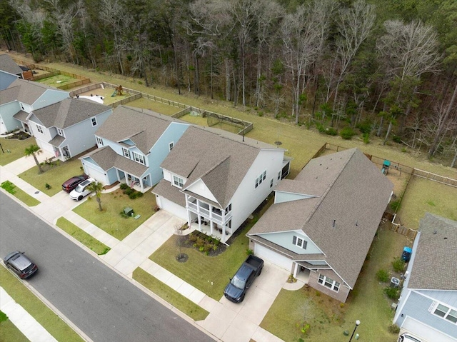 birds eye view of property with a residential view