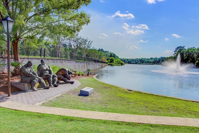 view of water feature with fence