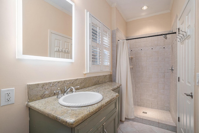 bathroom featuring vanity, ornamental molding, tile patterned floors, and a shower with shower curtain