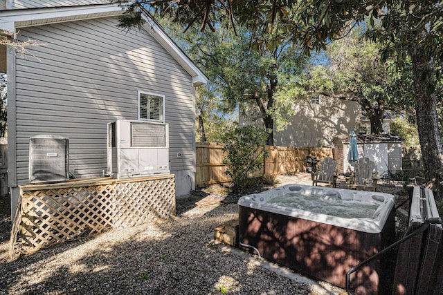 view of yard with a hot tub