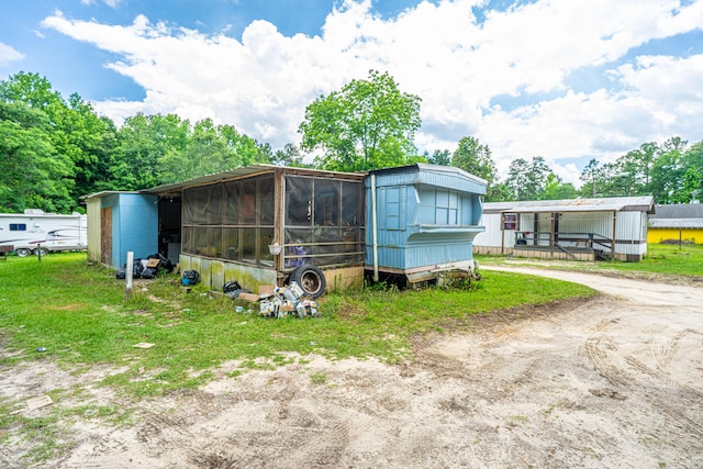 1265 Trojan Rd 1269 1271, 1273, Cross, SC 29436 - view of outdoor structure with dirt driveway and an outdoor structure