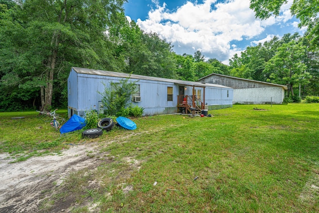 1265 Trojan Rd 1269 1271, 1273, Cross, SC 29436 - rear view of property with a yard