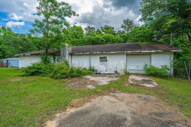 1265 Trojan Rd 1269 1271, 1273, Cross, SC 29436 - rear view of property with driveway and a garage