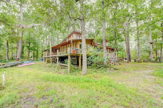 view of yard with a wooden deck