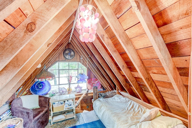 bedroom with lofted ceiling