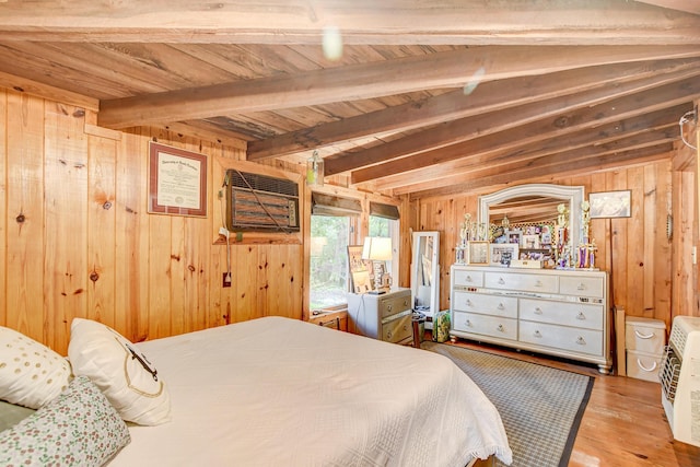 bedroom featuring hardwood / wood-style flooring, a wall unit AC, beam ceiling, and wood walls