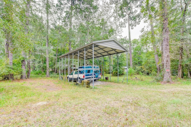 view of yard with a carport