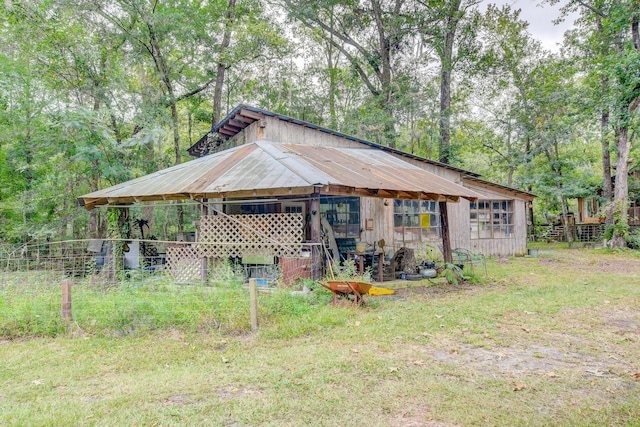 exterior space with a yard