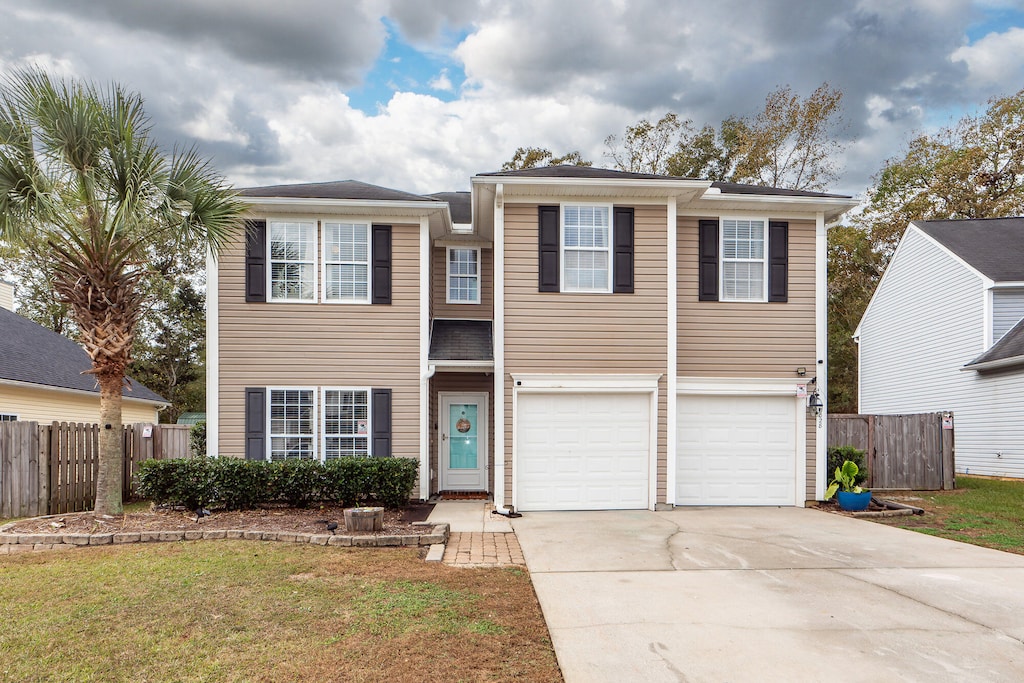 view of front of property with a garage