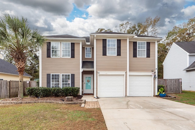 view of front of property with a garage