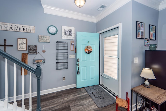 entrance foyer with dark hardwood / wood-style flooring and crown molding