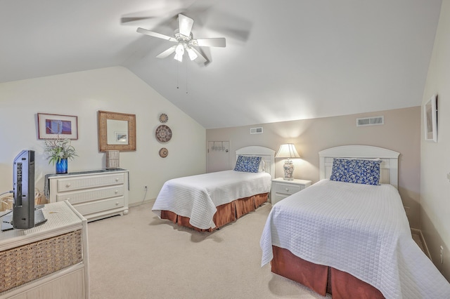 bedroom featuring carpet flooring, vaulted ceiling, and ceiling fan